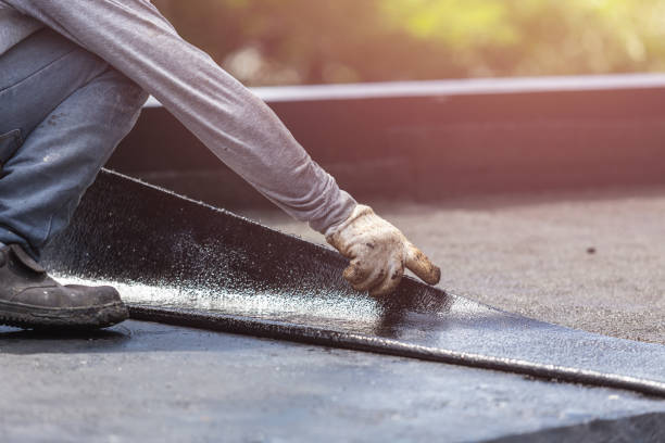 Professional Emergency Waterproofing technician working in Adrian, MI